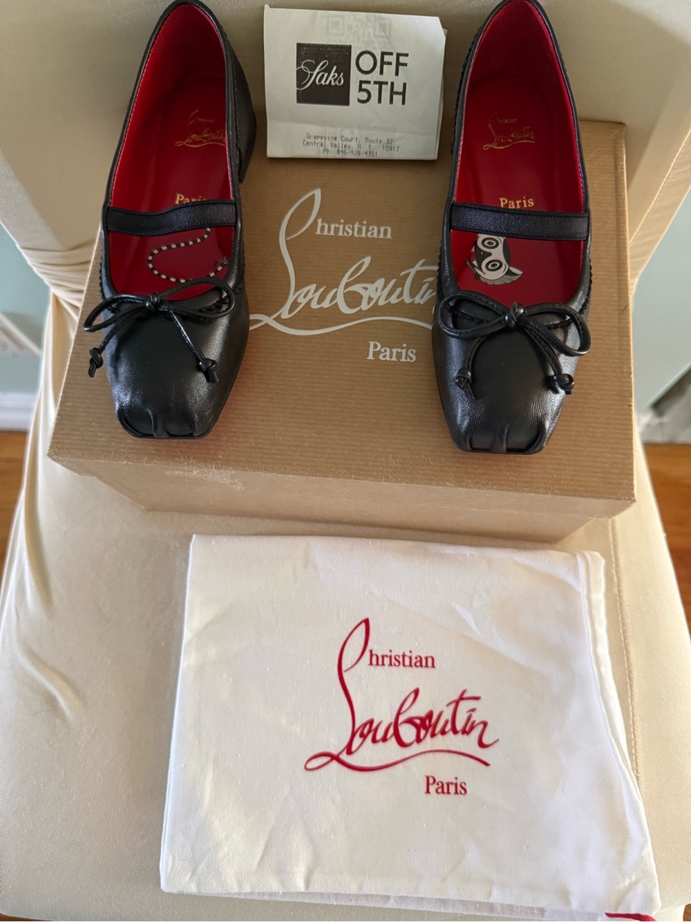 Kids Christian Louboutin Black Flats with Red Sole